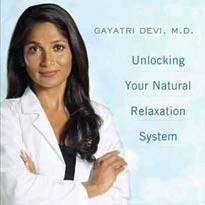 Image of book, A Calm Brain, Unlocking your natural relaxation system with a photo of Dr. Devi on cover.